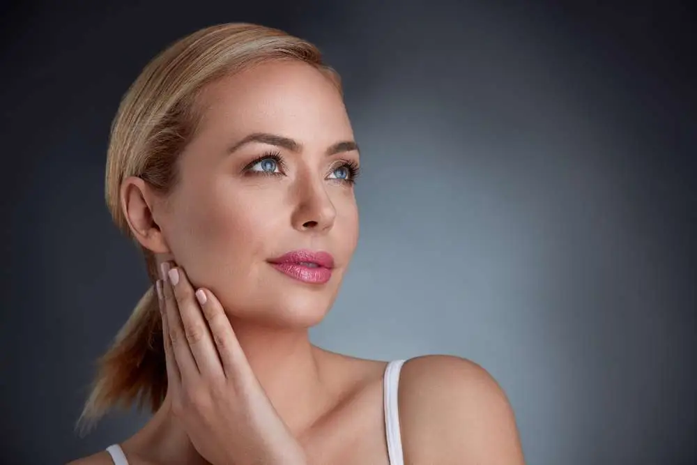 Patient reviewing dermal filler treatment plan with clinical team at Allurant Medical Spa