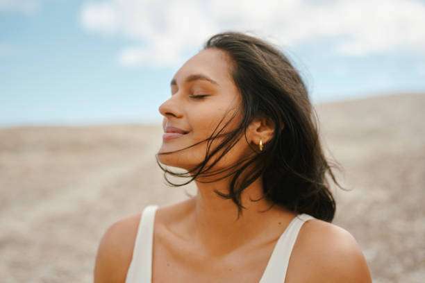 Woman with restored skin after no alcohol drinking