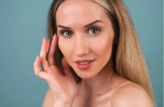 Close up of a woman's under eye area showing smooth, refreshed skin after treatment