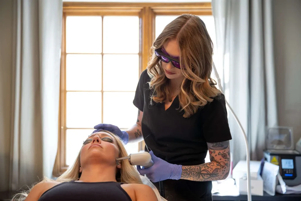 Physician treating patient with Adva Tx laser treatment in San Diego.
