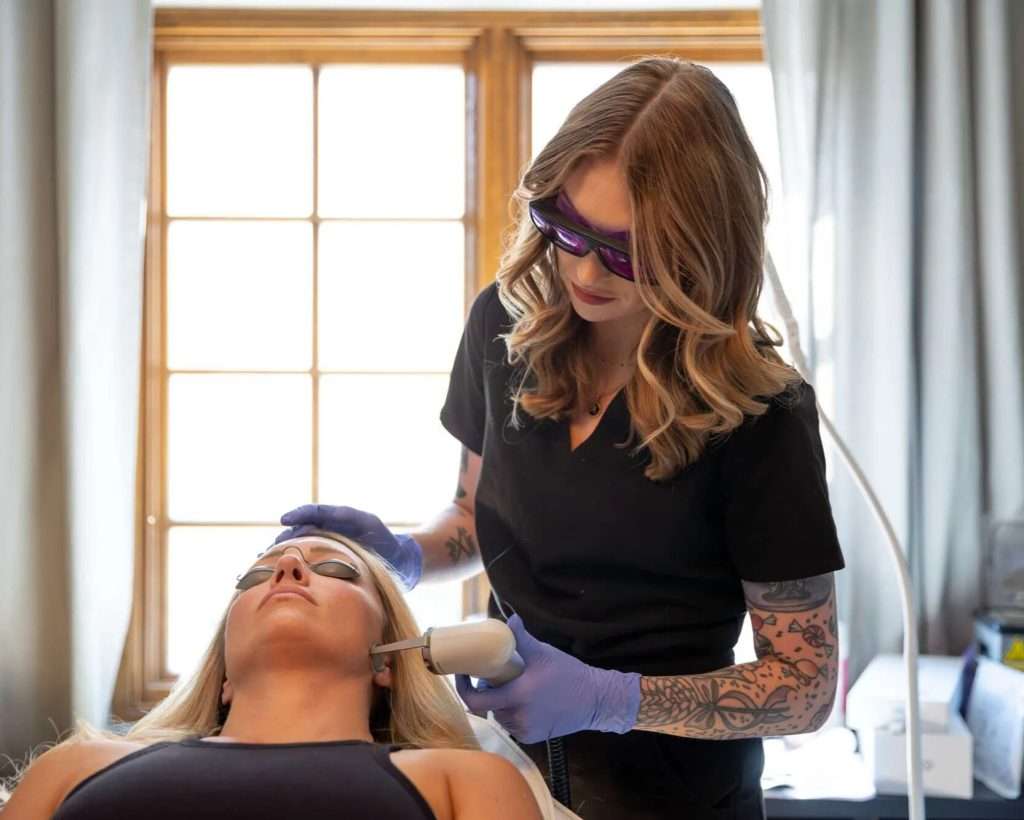 Physician treating patient with Adva Tx Laser