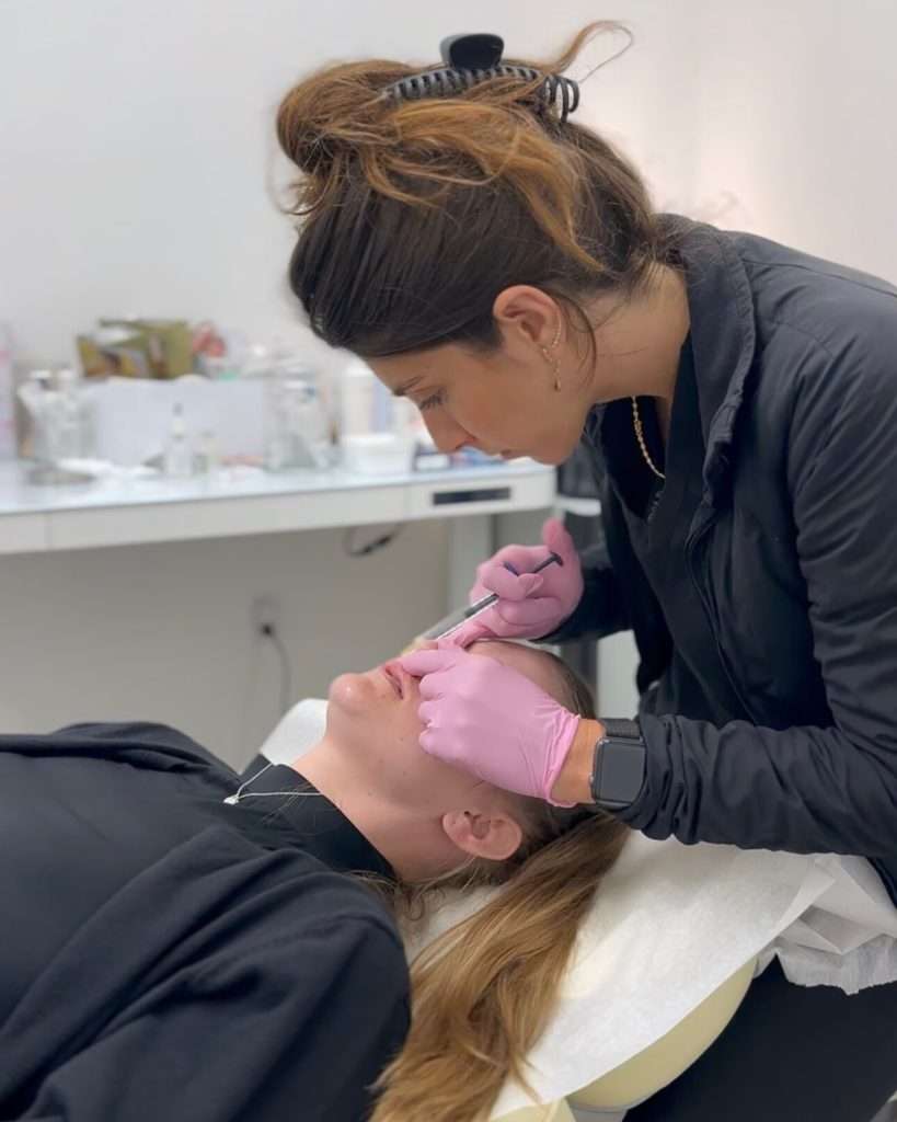 expert injector performing lip filler injections at Allurant Medical Spa in San Diego