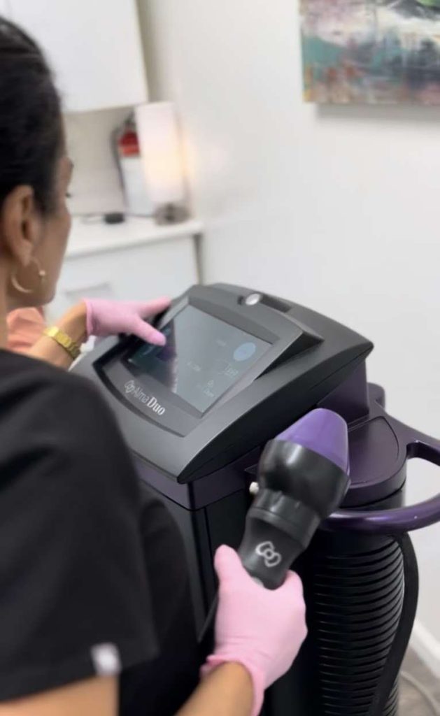 physician performing shockwave therapy