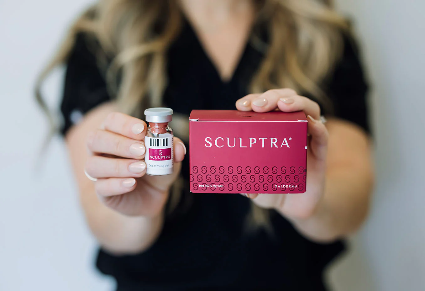 Dr. Kat Khorrami MD reviewing Sculptra treatment plan with patient at Allurant Medical Spa