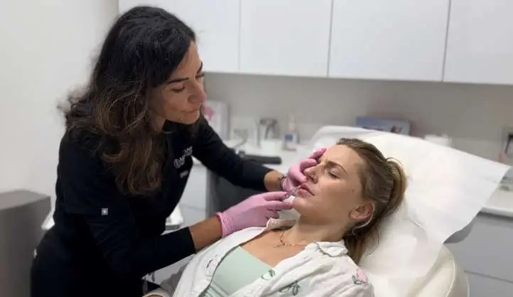 Dr. Kat Khorrami MD performing aesthetic treatment at Allurant Medical Spa San Diego