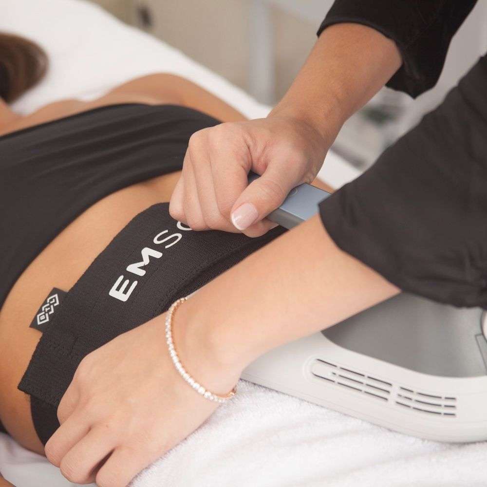 Emsculpt body contouring treatment targeting abdominal muscles at Allurant Medical Spa in San Diego
