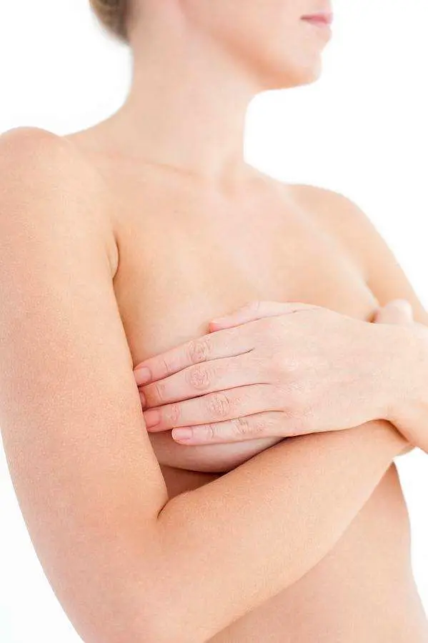 Female patient non surgical breast enhancement chest treatment consultation Allurant Medical Spa San Diego