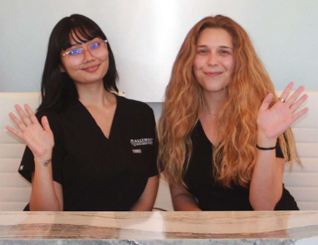Front desk team at Allurant Medical Spa in San Diego welcoming a patient