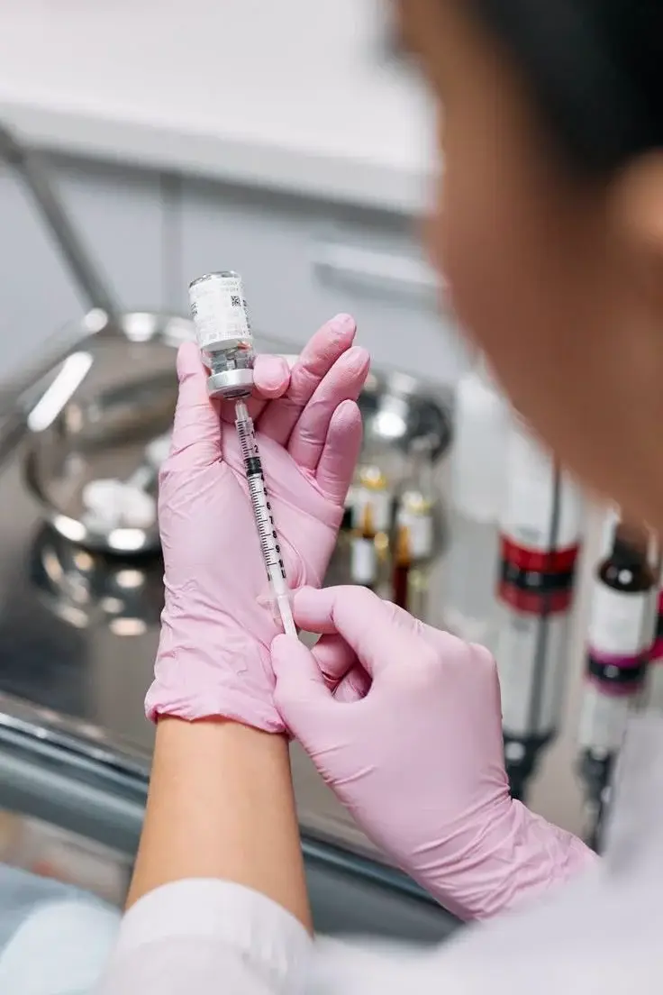 Provider preparing Dysport neurotoxin injection treatment Allurant Medical Spa San Diego