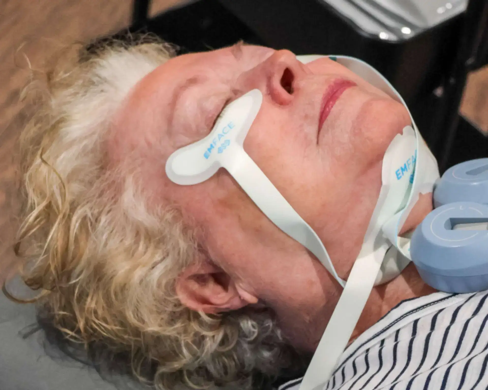 Older woman with lifted, firm skin after EMFACE treatment for facial muscle tightening without surgery at Allurant Medical in Carmel Valley San Diego