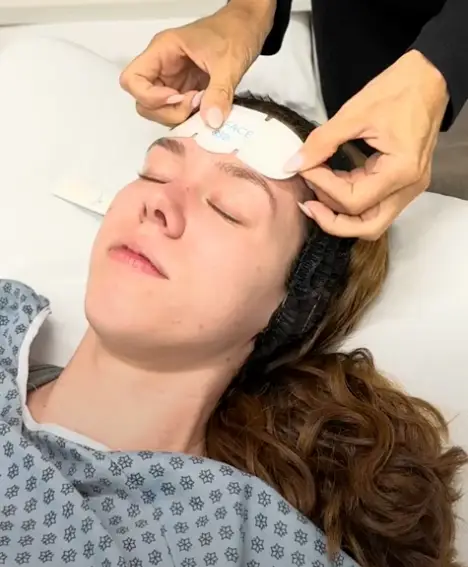 Dr. Kat Khorrami MD consulting with a patient about EMFACE treatment experience at Allurant Medical Spa San Diego