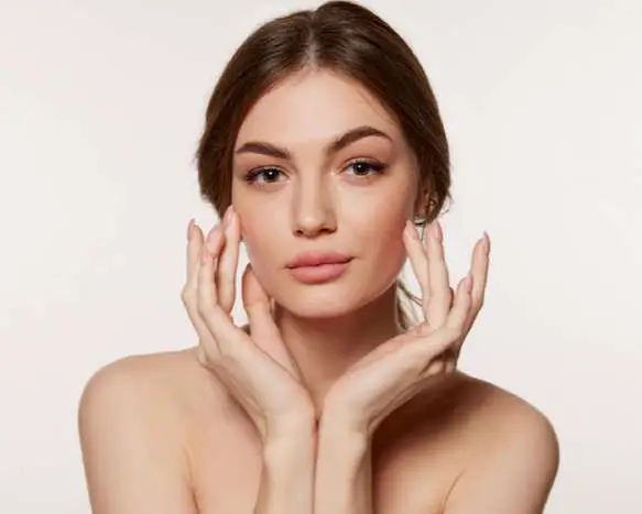 Woman with clear healthy skin showing EMFACE San Diego collagen results at Allurant Medical