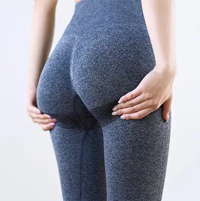 Woman evaluating whether a Brazilian Butt Lift is right for her at Allurant Medical Spa San Diego