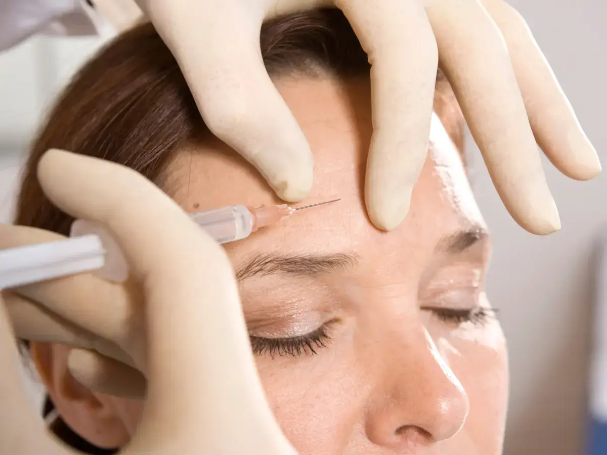 Patient consulting with a provider after experiencing concerns about Botox Gone Bad and seeking natural-looking Botox Results.