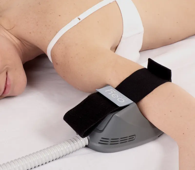 Patient comparing Emsculpt Neo and EvolveX arm muscle treatment options at Allurant Medical Spa