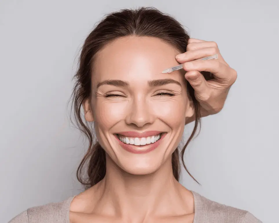 Patient receiving Botox treatment for forehead lines and crow's feet during a physician-directed consultation in San Diego.
