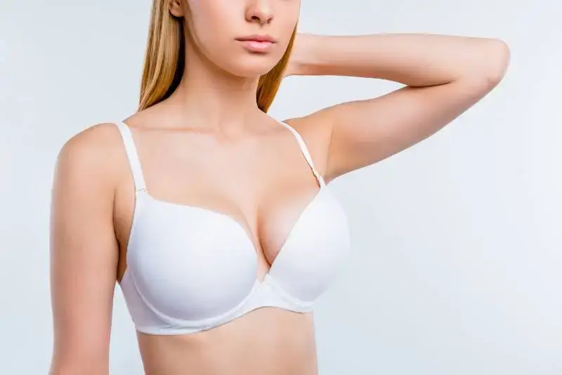 Woman consulting with provider about non surgical breast enhancement San Diego options at Allurant Medical Spa