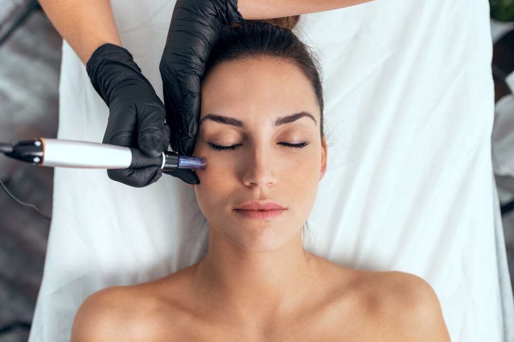 Allurant Medical Spa provider consulting a patient about under eye treatments in San Diego