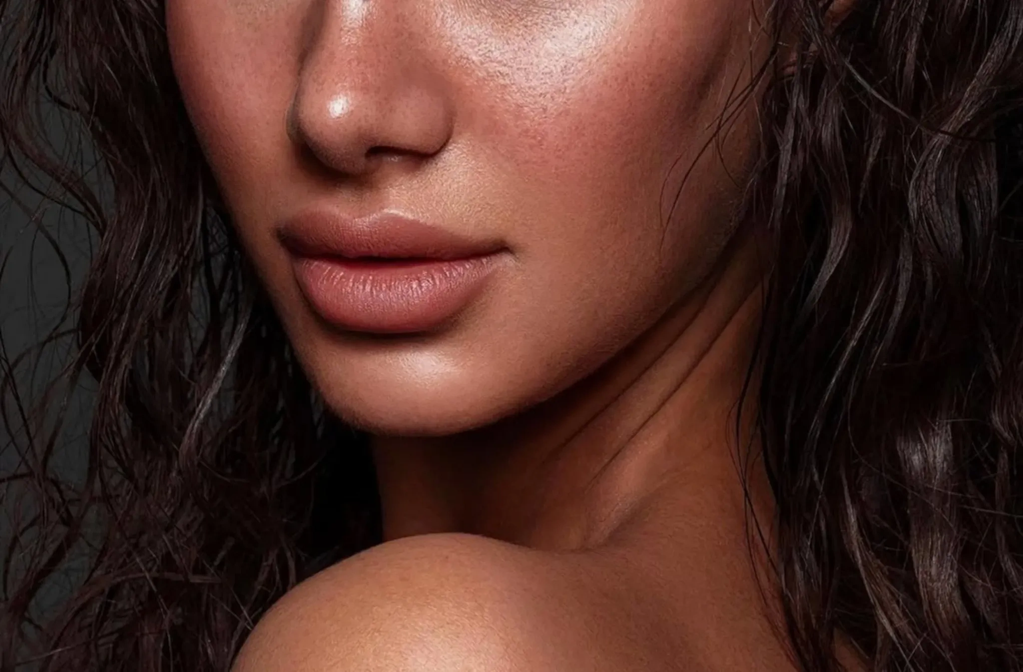 Close-up of natural looking lip fillers results on a San Diego patient's smile