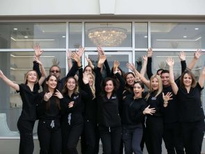 Medical spa staff celebrating client progress at San Diego med spa